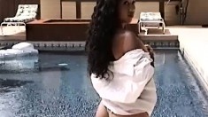 Cute little Noy is out by the pool posing and showing her nice ass
