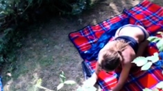 Stepdaughter stroking her pussy in our garden