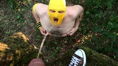 Pissing Master Uses Slave Outdoors for Pleasure