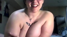 Chesty brunette rides fat cock as huge boobs bounce
